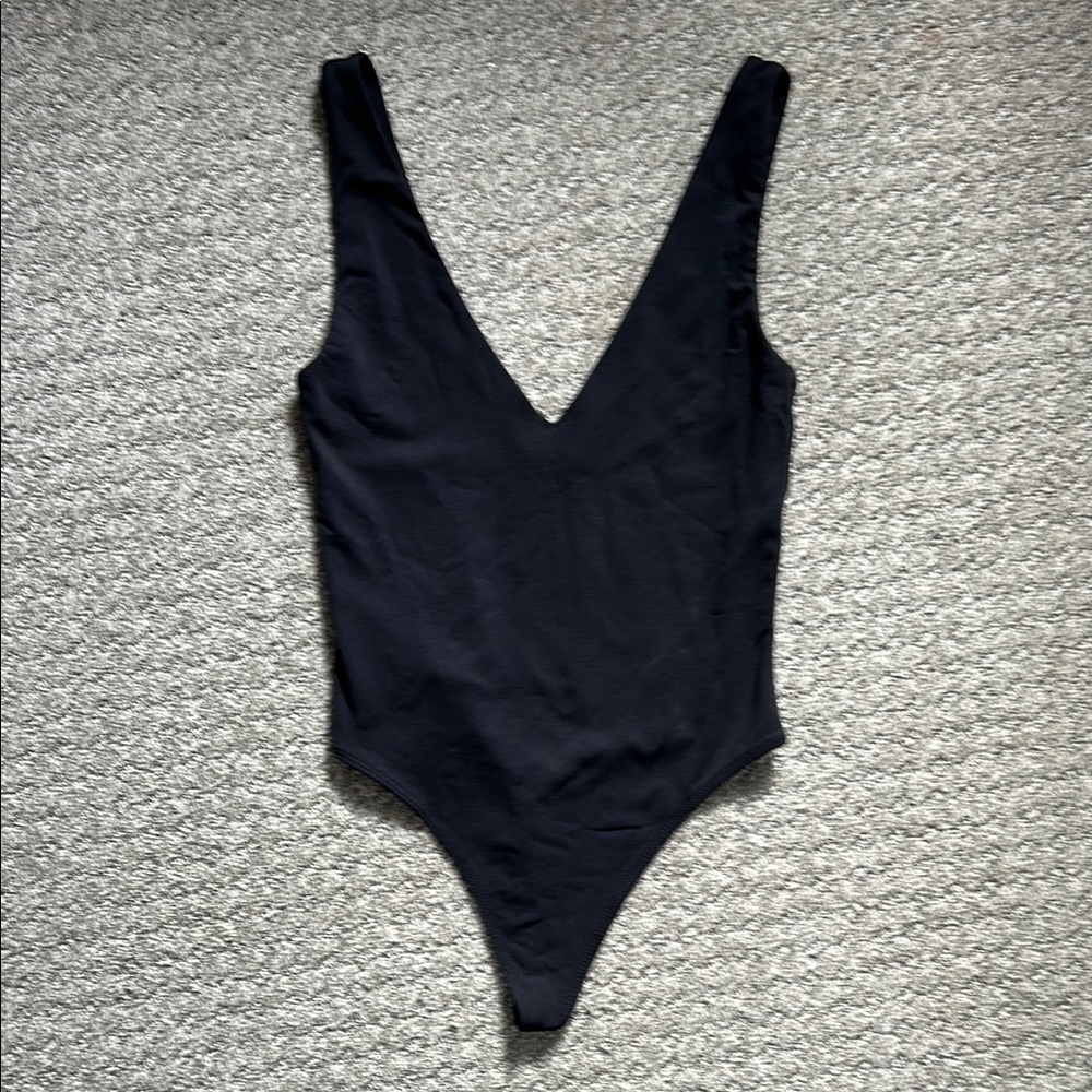 A baton black bodysuit size S
